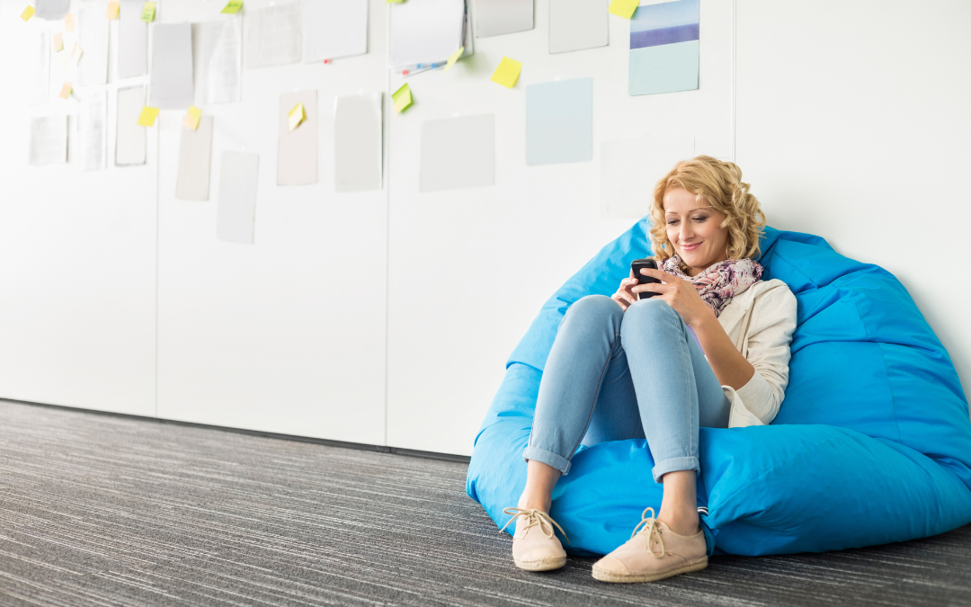 Female marketer working on a beanbag