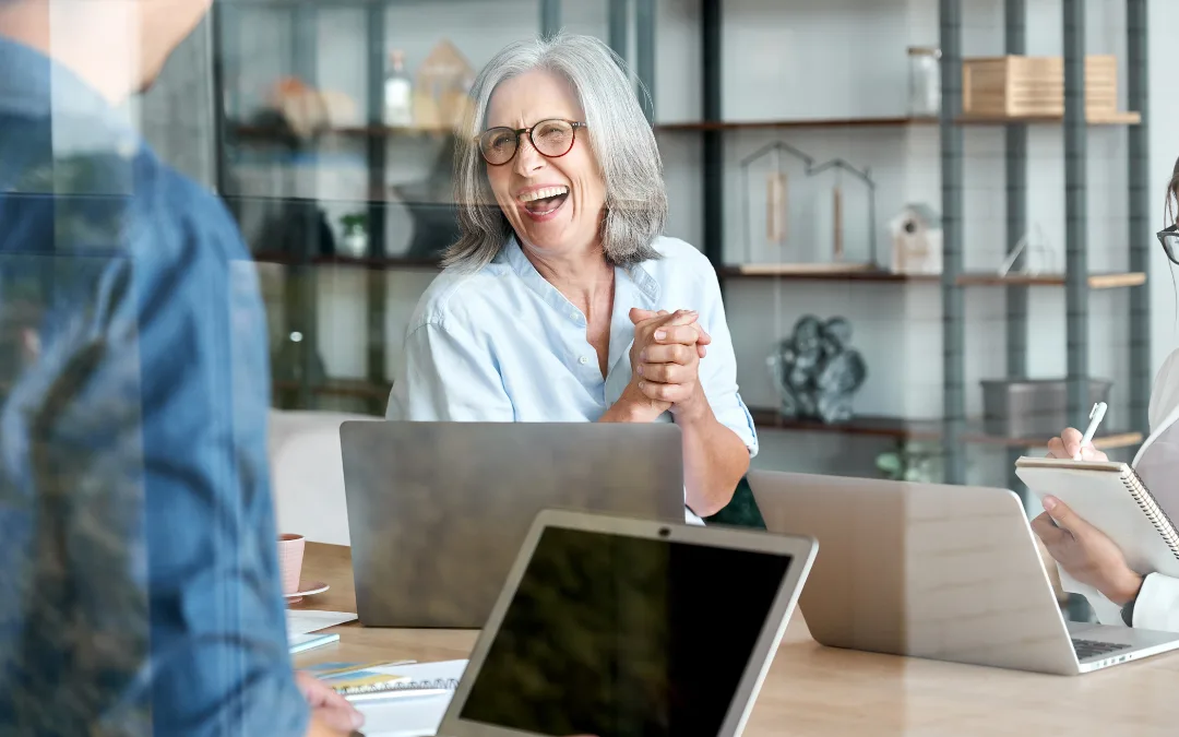 Advertising agency workers laughing
