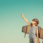 Kid with jetpack representing ambitious startup attitude
