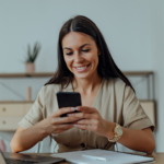 A women smiling after growing her accounting business with the help of a business coach.